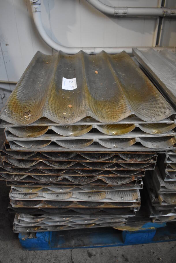17 Metal Perforated 4 Loaf Baking Pans. 18x26x1. 17 Times Your Bid! - Image 2 of 3