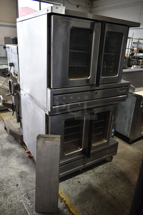 2 Garland SunFire Stainless Steel Commercial Natural Gas Powered Full Size Convection Ovens w/ View Through Doors, Metal Oven Racks and Thermostatic Controls on Commercial Casters. 2 Times Your Bid!