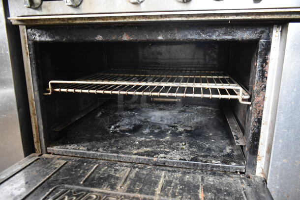 Imperial Stainless Steel Commercial Natural Gas Powered 6 Burner Range w/ Oven and Back Splash on Commercial Casters. - Image 6 of 6