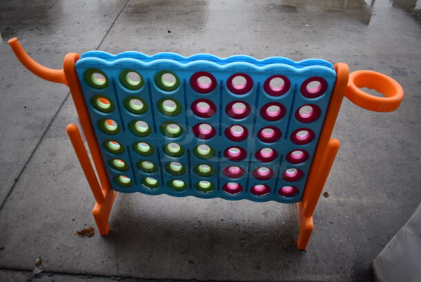 Blue and Orange Poly Countertop Connect Game w/ Green and Pink Discs. 47x14x31