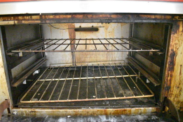 Vulcan 36XTL-559 Stainless Steel Commercial Propane Gas Powered Flat Top Griddle w/ Oven, Over Shelf and Back Splash on Commercial Casters. - Image 5 of 7
