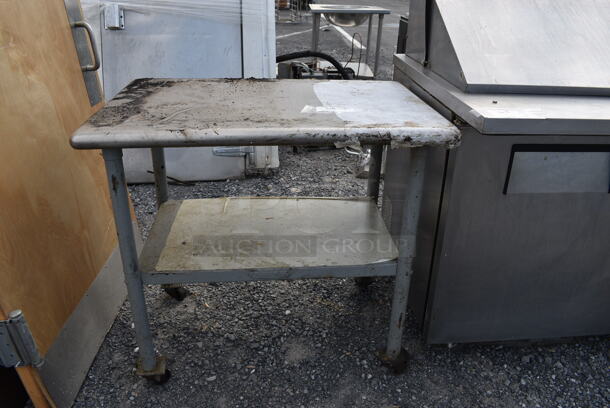 Stainless Steel Table w/ Metal Under Shelf on Commercial Casters. 36x24x34