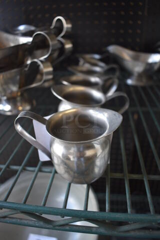 6 Metal Cream Pitchers. 4x2.5x2.5. 6 Times Your Bid!