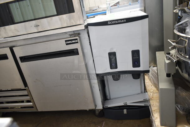 BRAND NEW SCRATCH AND DENT! 2024 Scotsman HID312AB-1A Meridian Countertop Air Cooled Ice Machine and Water Dispenser with Push Button Dispensing - 12 lb. Bin Storage. 115 Volts, 1 Phase.  - Image 2 of 3