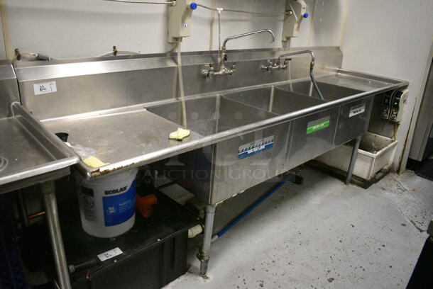 Stainless Steel Commercial 3 Bay Sink w/ Dual Drain Boards, 2 Faucets and 2 Handle Sets. 120x30x44. Bays 24x24x14. Drain Boards 23x26x2. BUYER MUST REMOVE. (kitchen) - Image 1 of 8