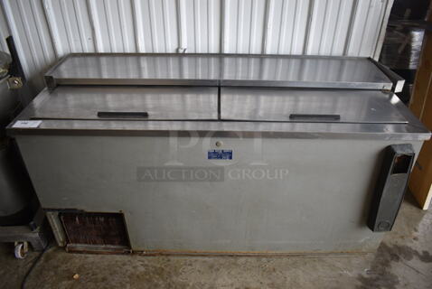 Stainless Steel Commercial Back Bar Bottle Cooler w/ 2 Sliding Lids. 65x28x34. Tested and Powers On But Does Not Get Cold