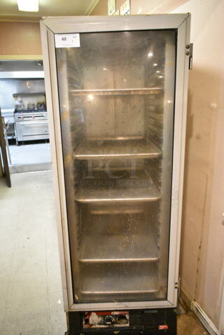Metro HM2000 Metal Commercial Heated Holding Cabinet on Commercial Casters. 115/208 Volts, 1 Phase. This Unit Was In Working Condition When the Restaurant Closed. (kitchen entryway)