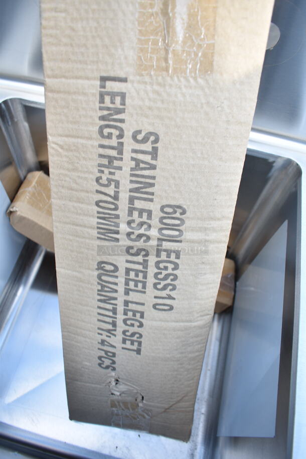 BRAND NEW SCRATCH AND DENT! Regency 600S31515 54" 16-Gauge Stainless Steel Three Compartment Commercial Sink with Galvanized Steel Legs and without Drainboards - 15" x 15" x 12" Bowls - Image 7 of 8