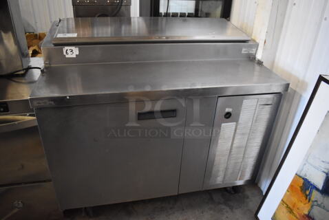 Stainless Steel Commercial Pizza Prep Table on Commercial Casters. 115 Volts, 1 Phase. Tested and Powers On But Does Not Get Cold