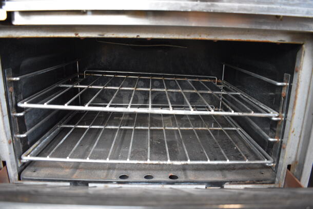 Garland Stainless Steel Commercial Natural Gas Powered 10 Burner Range w/ 2 Ovens, Cheese Melter, Over Shelf and Back Splash. 60x33x68 - Image 6 of 8