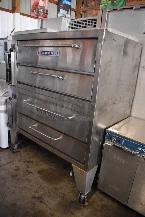 2 2014 Baker's Pride Model 3151 Stainless Steel Commercial Natural Gas Powered Single Deck Pizza Ovens w/ Cooking Stones on Commercial Casters. 57x33.5x67. 2 Times Your Bid!