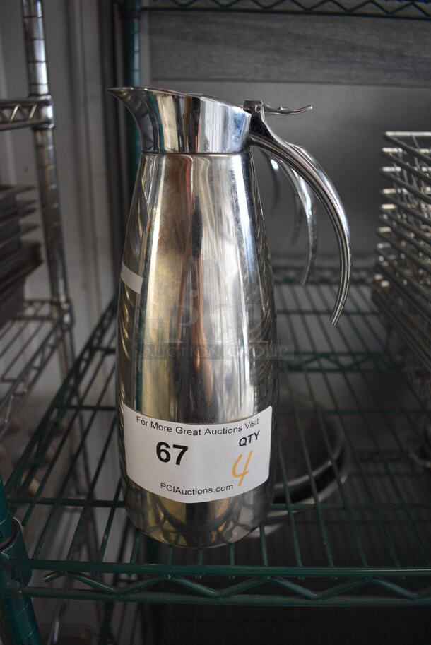 4 Metal Coffee Pitchers. 5x4x10. 4 Times Your Bid! - Image 1 of 4