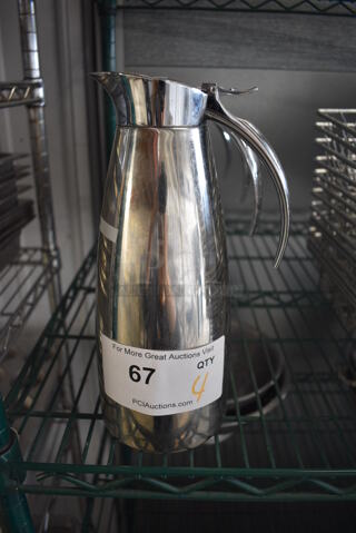 4 Metal Coffee Pitchers. 5x4x10. 4 Times Your Bid!