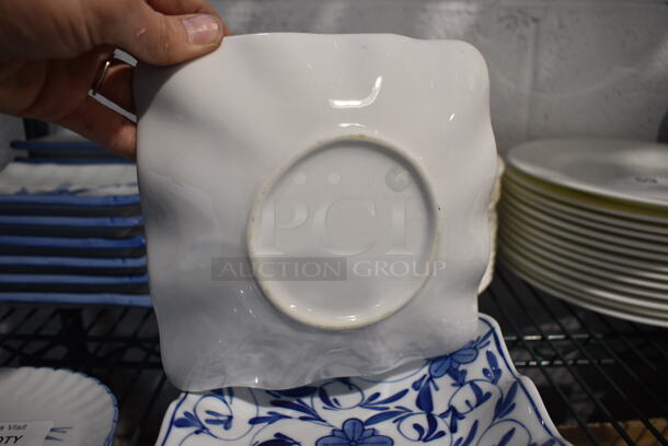4 White and Blue Ceramic Square Plates. 6.75x6.75x1. 4 Times Your Bid! - Image 3 of 3