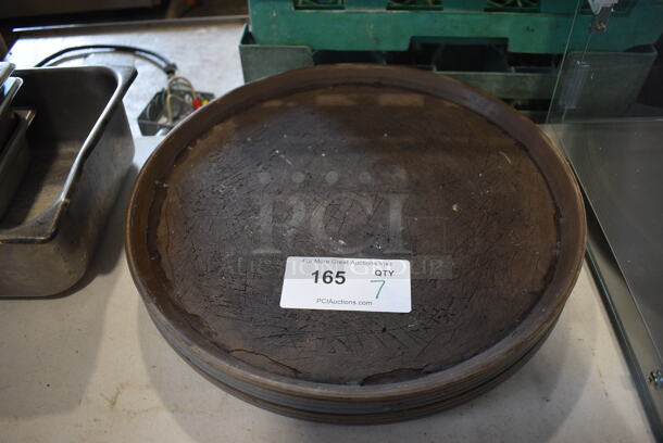 7 Round Serving Trays. 16x16x1. 7 Times Your Bid!