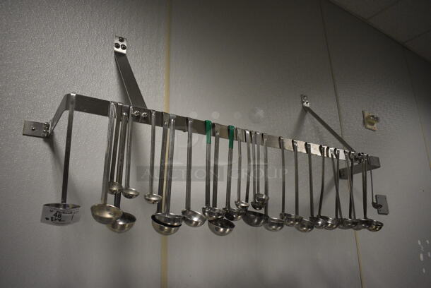 Stainless Steel Commercial Wall Mount Pot Rack w/ Various Metal Ladles. 60x12x16. BUYER MUST REMOVE. (kitchen) - Image 1 of 4