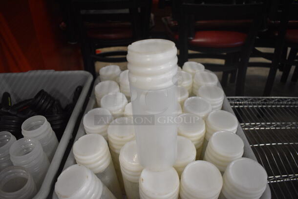 ALL ONE MONEY! Lot of 2 Gray Poly Bins of Various Items Including 30 Condiment Bottles and Lids - Image 2 of 3