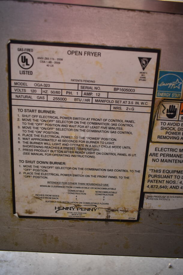 2016 Henny Penny OGA-323 ENERGY STAR Stainless Steel Commercial Natural Gas Powered 3 Bay Fryer w/ 4 Metal Fry Baskets on Commercial Casters. 255,000 BTU.  - Image 12 of 12