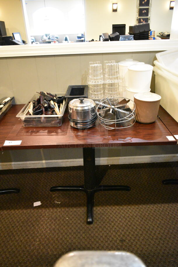 Wood Pattern Dining Height Table w/ Contents Including Utensils, Cups, Poly Cylindrical Drop Ins, Pie Cutters. (main dining room) - Image 1 of 4