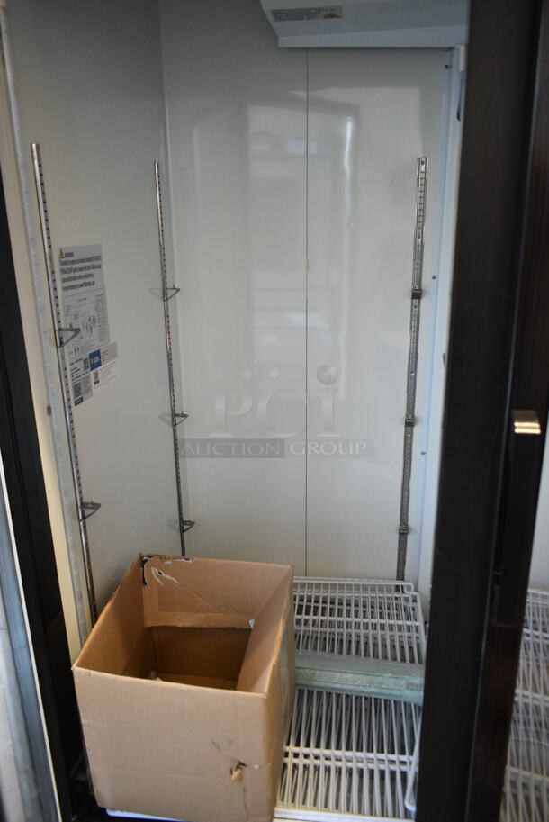 BRAND NEW SCRATCH AND DENT! 2024 Avantco 178GDC49HCB 53" Black Customizable Swing Glass Door Merchandiser Refrigerator with LED Lighting and Poly Coated Racks. 115 Volts, 1 Phase. Tested and Powers On But Does Not Get Cold - Image 6 of 10