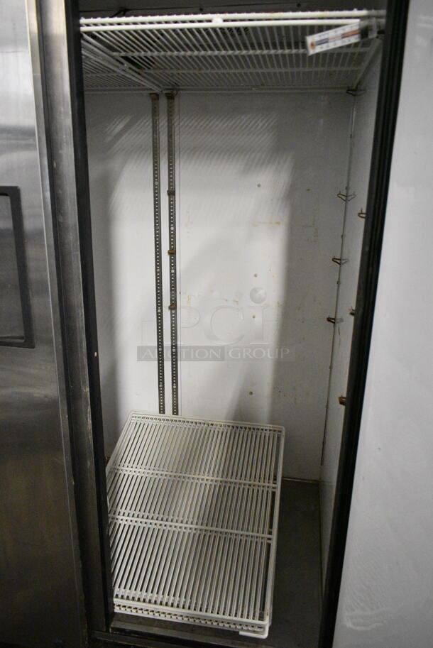 True TG2R-2S ENERGY STAR Stainless Steel Commercial 2 Door Reach In Cooler w/ Poly Coated Racks on Commercial Casters. 115 Volts, 1 Phase. Tested and Powers On But Does Not Get Cold - Image 4 of 6