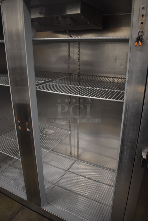 Continental 2FE ENERGY STAR Stainless Steel Commercial 2 Door Reach In Freezer on Commercial Casters. Missing Doors. 115 Volts, 1 Phase. 57x34x82. Tested and Does Not Power On - Image 2 of 6