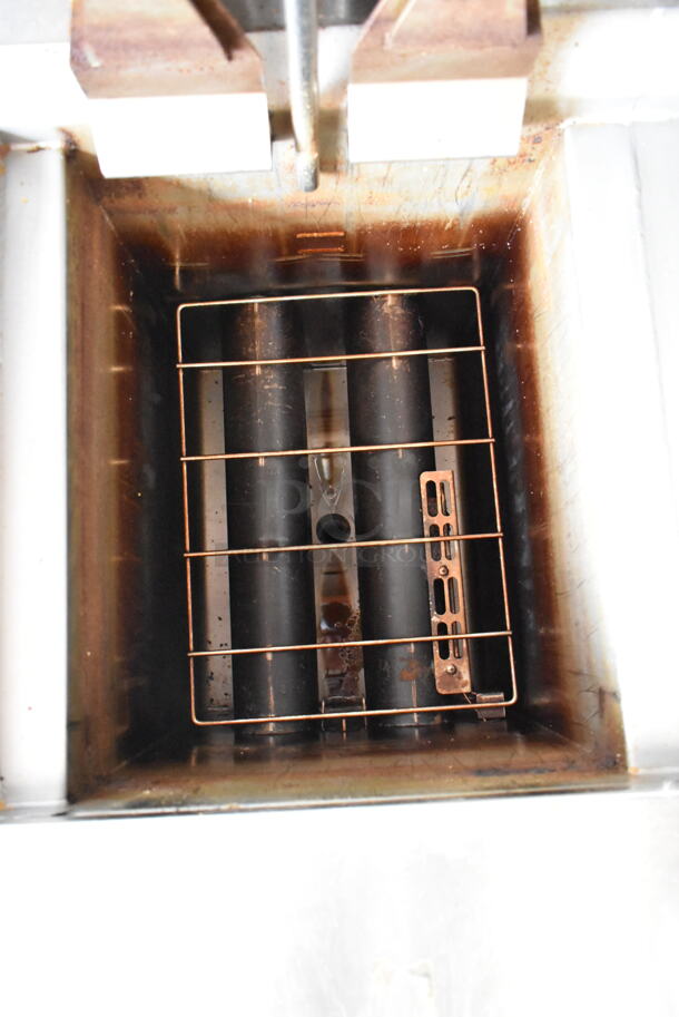 2020 Henny Penny OGA-323 ENERGY STAR Stainless Steel Commercial Natural Gas Powered 3 Bay Fryer w/ 3 Metal Fry Baskets on Commercial Casters. 255,000 BTU.  - Image 7 of 12