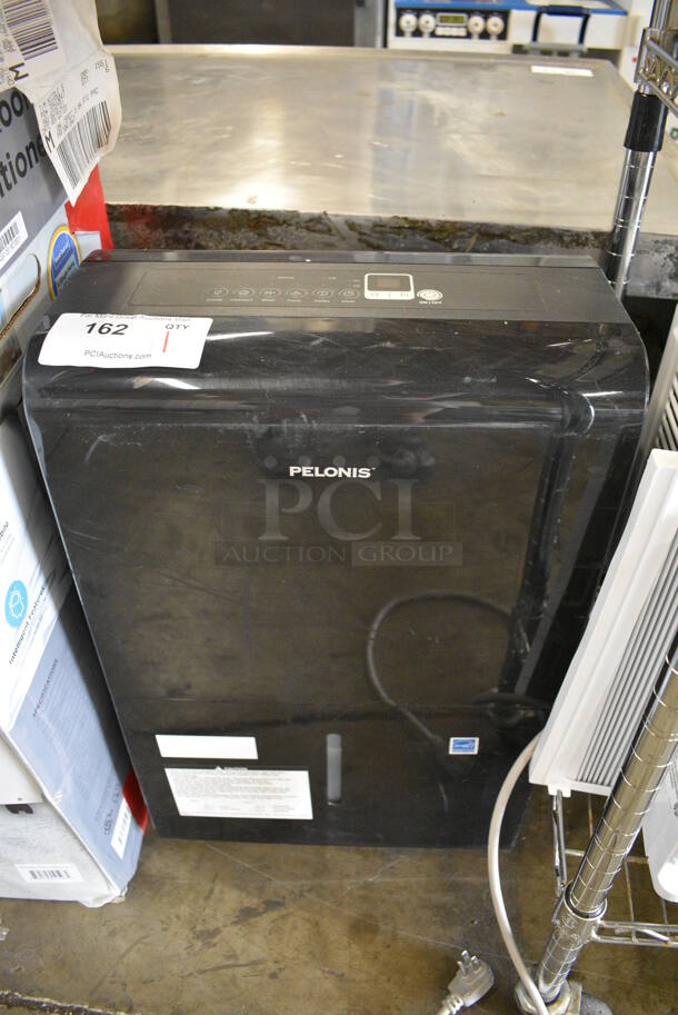 Pelonis PAD50P1ABL Dehumidifier on Casters. 115 Volts, 1 Phase. 15.5x11x24.5. Tested and Working!