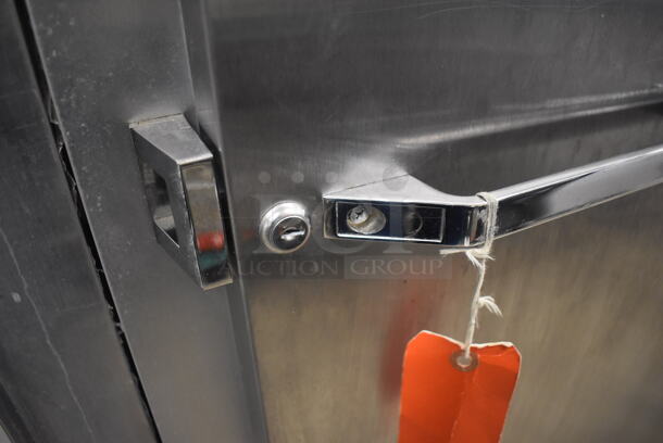 Continental 1FE Stainless Steel Commercial Single Door Reach In Freezer on Commercial Casters. Door Is Locked. 115 Volts, 1 Phase. 28.5x36x77.5. Tested and Powers On But Temps at 46 Degrees - Image 4 of 4
