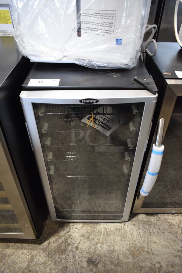 BRAND NEW SCRATCH AND DENT! Danby DWC350BLP 36 Bottle Free-Standing Wine Cooler in Platinum.. 115 Volts, 1 Phase. Tested and Working! - Image 1 of 6