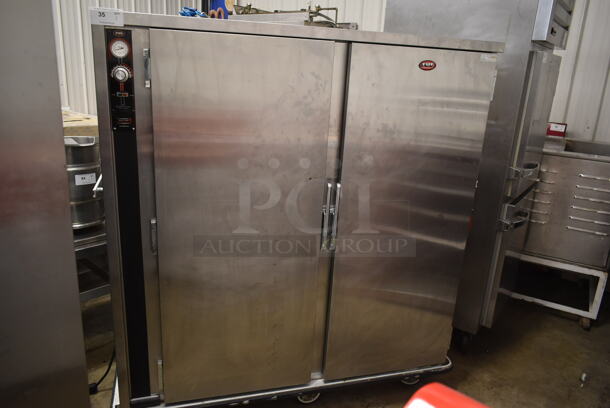 FWE P-180-2 Stainless Steel Commercial 2 Door Reach In Heated Holding Warming Cabinet on Commercial Casters. 120 Volts, 1 Phase. Tested and Working!