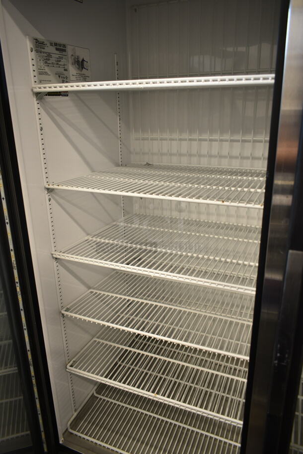 2016 True GDM-72F-HC Metal Commercial 3 Door Reach In Freezer Merchandiser w/ Poly Coated Racks. 115/208-230 Volts, 1 Phase.  - Image 6 of 7