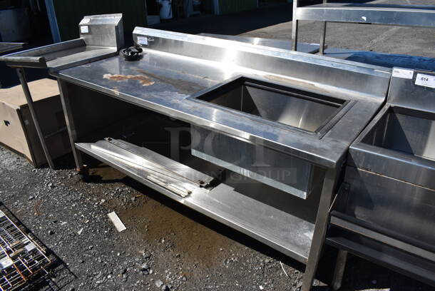 Stainless Steel Commercial Table w/ Ice Bin, Back Splash and Under Shelf. 1 Caster Needs To Be Reattached. 72x29x42