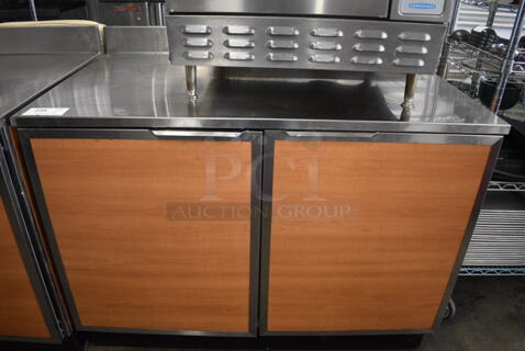 Duke Model RUF-48M Stainless Steel Commercial 2 Door Work Top Cooler w/ Poly Coated Racks on Commercial Casters. 120 Volts, 1 Phase. 48x30x40. Tested and Working!