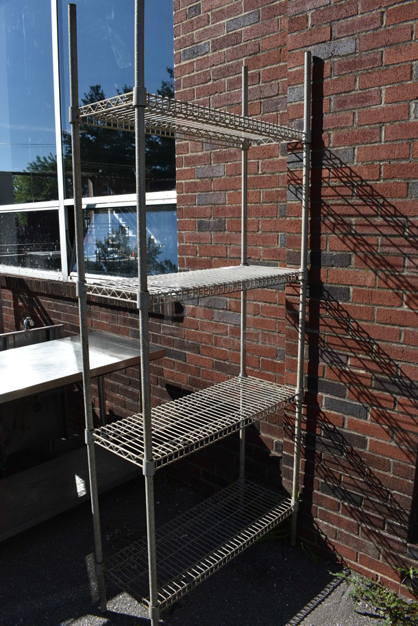 Metal 4 Tier Wire Shelving Unit. BUYER MUST DISMANTLE. PCI CANNOT DISMANTLE FOR SHIPPING. PLEASE CONSIDER FREIGHT CHARGES. 36x13.5x87
