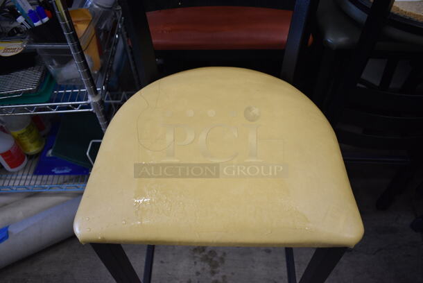 2 Black Metal Bar Height Chairs; Yellow and Red Seat Cushions. 17x18x44. 2 Times Your Bid! - Image 4 of 4