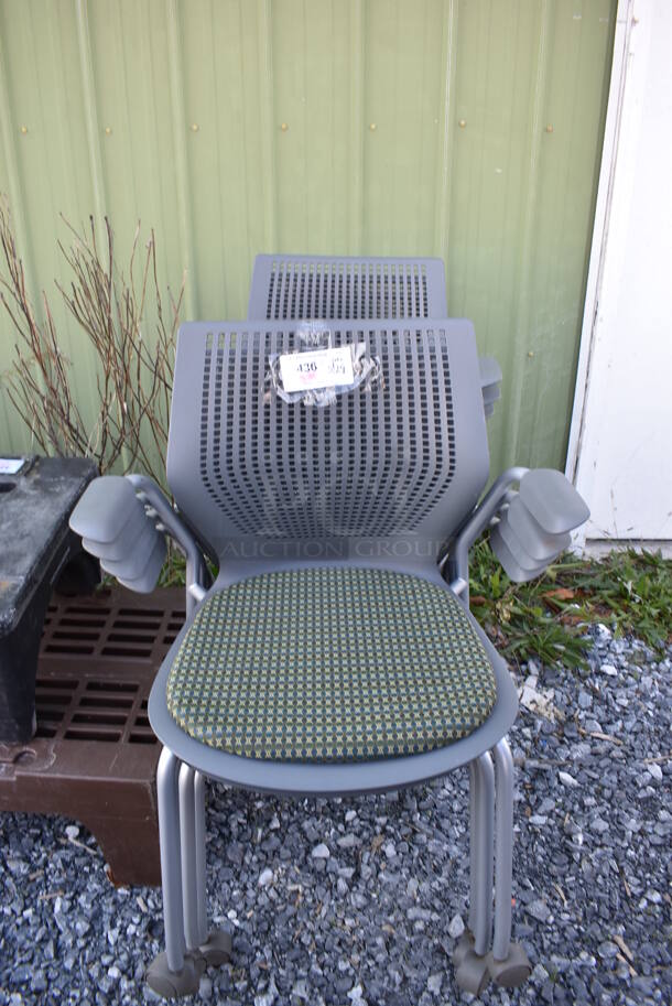 7 Gray Poly Chairs w/ Green Seat Cushion and Arm Rests. 25.5x22x33. 7 Times Your Bid!