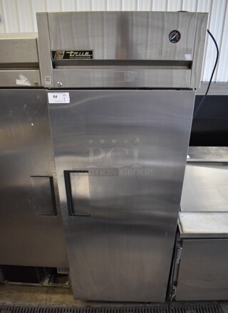 2011 True TG1R-1S Stainless Steel Commercial Single Door Reach In Cooler w/ Poly Coated Racks on Commercial Casters. 115 Volts, 1 Phase. 29x35x83. Tested and Working!