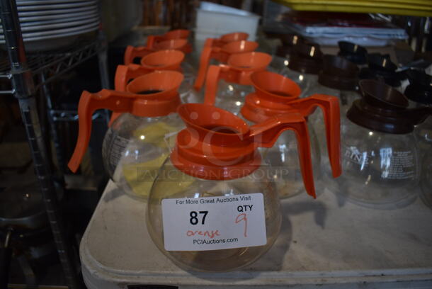 9 Coffee Pots w/ Orange Handle. 8x6x7. 9 Times Your Bid!