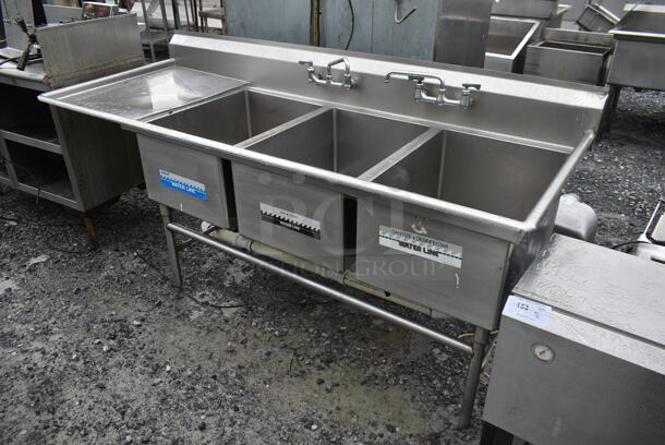 Stainless Steel Commercial 3 Bay Sink w/ Left Side Drain Board, 2 Faucets and 2 Handle Sets. Bays 20x28. Drain Boards 22x31 - Image 1 of 7