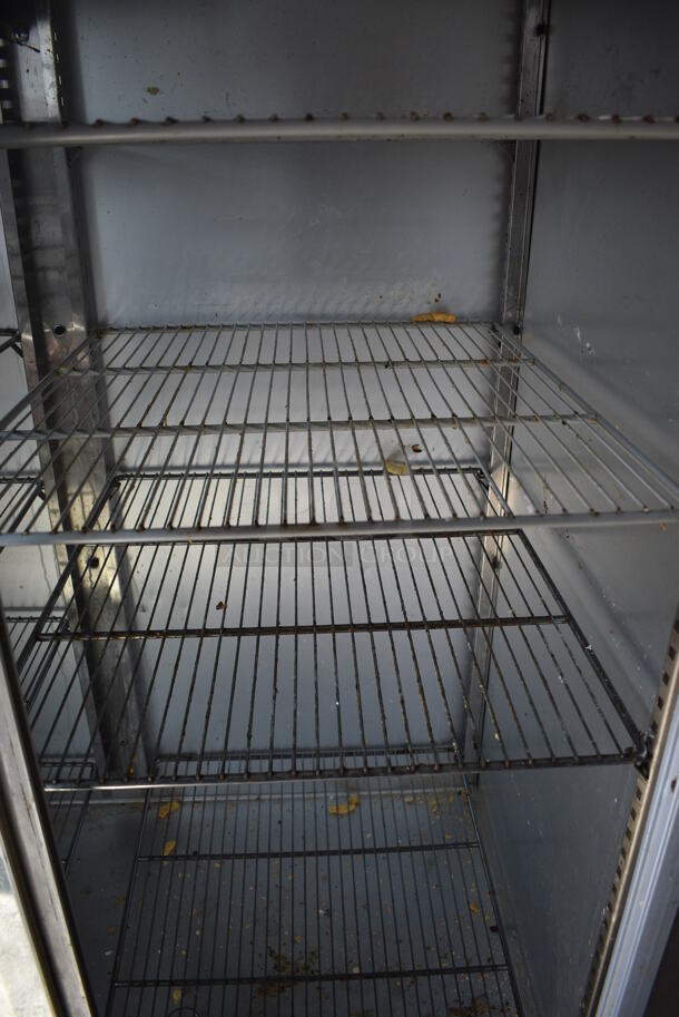 Delfield Model MRR2-SL Stainless Steel Commercial 2 Door Reach In Cooler Merchandiser w/ Metal Racks on Commercial Casters. 115 Volts, 1 Phase. 56x34x79. Tested and Working! - Image 4 of 5