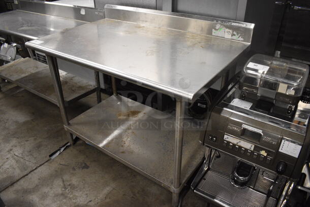 Stainless Steel Table w/ Back Splash and Under Shelf. 48x30x40