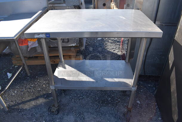 Stainless Steel Table w/ Metal Under Shelf on Commercial Casters. 36x24x39