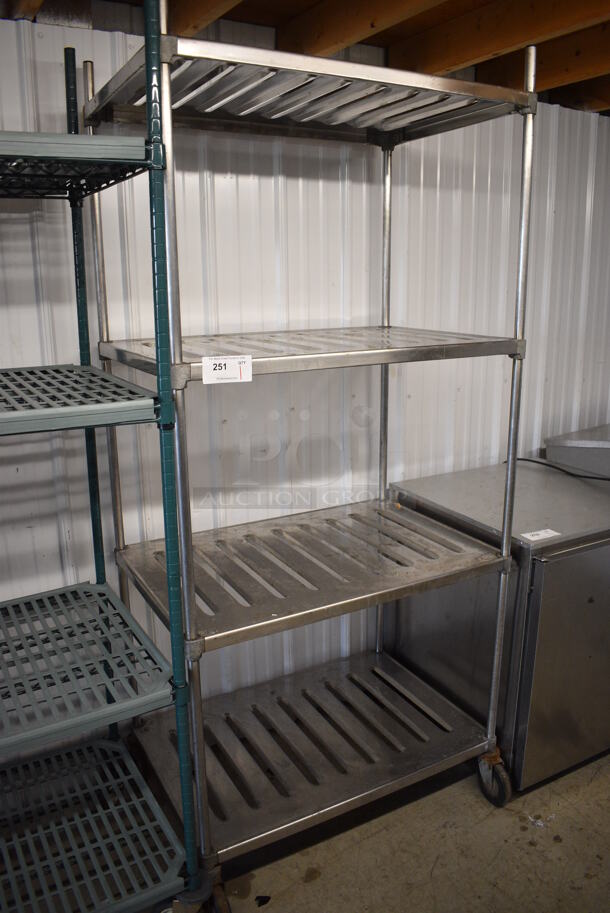 Metal 4 Tier Shelving Unit on Commercial Casters. BUYER MUST DISMANTLE. PCI CANNOT DISMANTLE FOR SHIPPING. PLEASE CONSIDER FREIGHT CHARGES. 36x24x80
