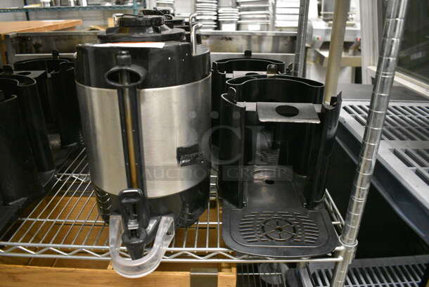 2 Stainless Steel and Black Poly Beverage Holder Dispenser and 2 Black Poly Stands w/ Drip Trays. 9x12x14, 9x13x10. 2 Times Your Bid! - Image 1 of 6