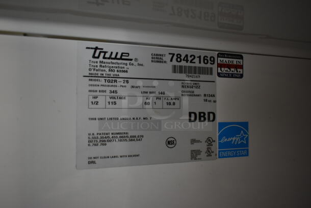 2013 True TG2R-2S ENERGY STAR Stainless Steel Commercial 2 Door Reach In Cooler w/ Poly Coated Racks on Commercial Casters. 115 Volts, 1 Phase. Tested and Working! - Image 8 of 8