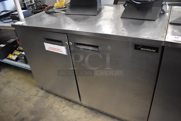 Delfield UC4048 Stainless Steel Commercial 2 Door Undercounter Cooler. 115 Volts, 1 Phase. 48x29x34. Tested and Powers On But Does Not Get Cold