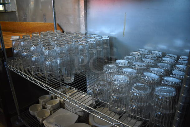 ALL ONE MONEY! Tier Lot of Approximately 47 Rocks Glasses and 104 Beverage Glasses. 3x3x5.5, 3x3x3.5