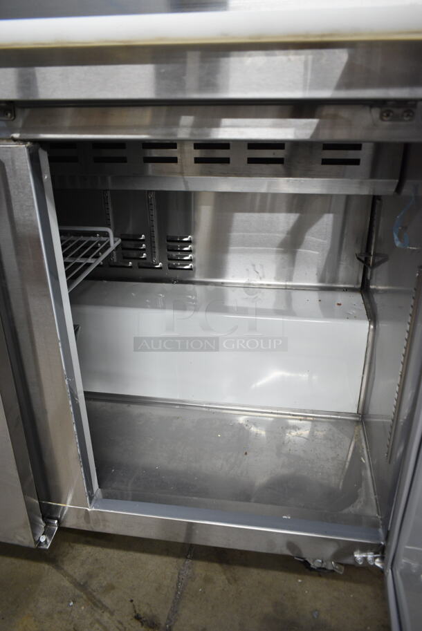 BRAND NEW SCRATCH AND DENT! 2024 Avantco 178APT71HC Stainless Steel Commercial 70" 3 Door Refrigerated Sandwich Prep Table on Commercial Casters. 115 Volts, 1 Phase. Tested and Working!  - Image 6 of 12