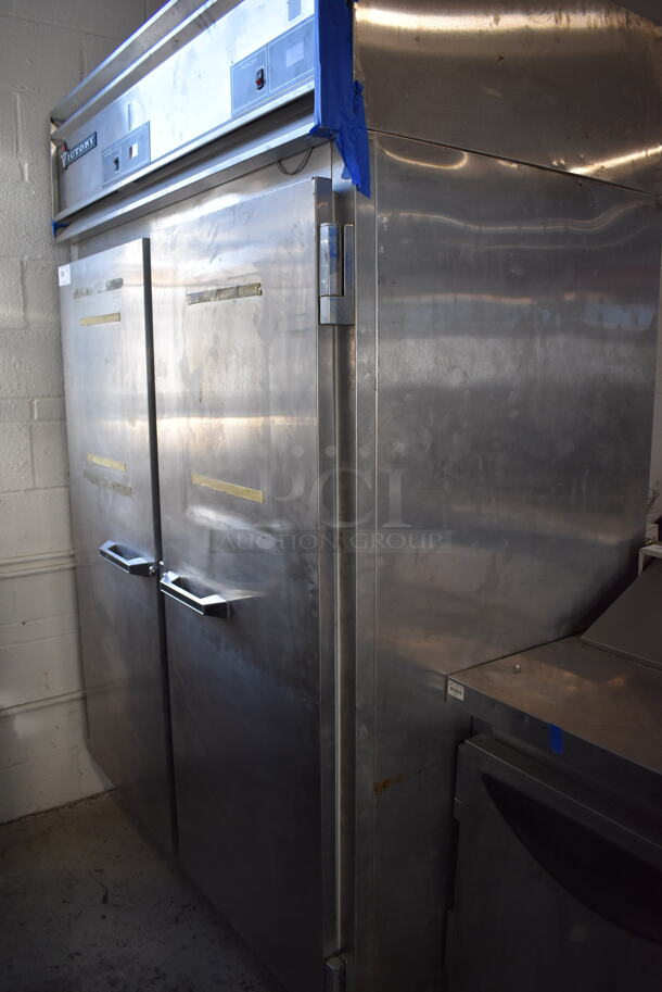 Victory RFSA-2D-S7 Stainless Steel Commercial 2 Door Reach In Cooler and Freezer Combo Unit. 115 Volts, 1 Phase. 52x36x84. Tested and Powers On and Cooler Works But Freezer Does Not Get Cold